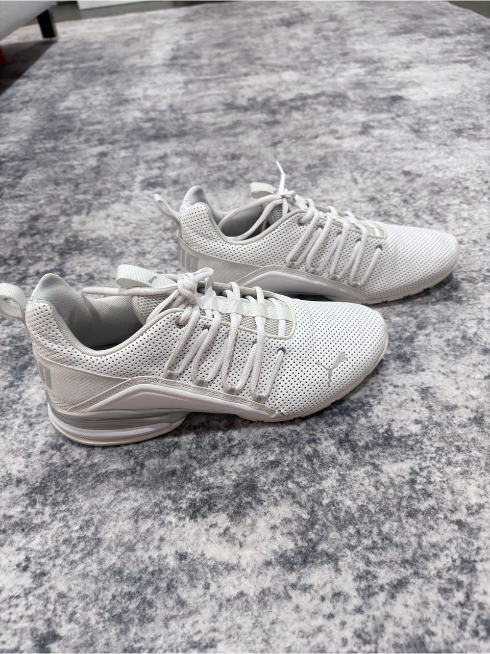 Puma men’s All-White Perforated Mesh Athletic Sneakers